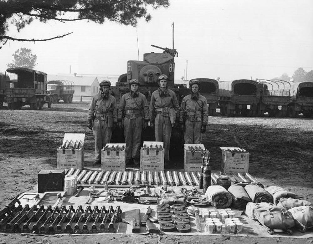 M3 Stuart light tank displayed with the tank crew and equipment at Ft. Benning, Georgia in December 1941. (U.S. Army Photograph.)