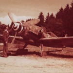 U.S. soldier inspects a German Me 109 fighter abandoned on the airfield at Salzburg, Austria by retreating German forces. (U.S. Air Force Photograph.)