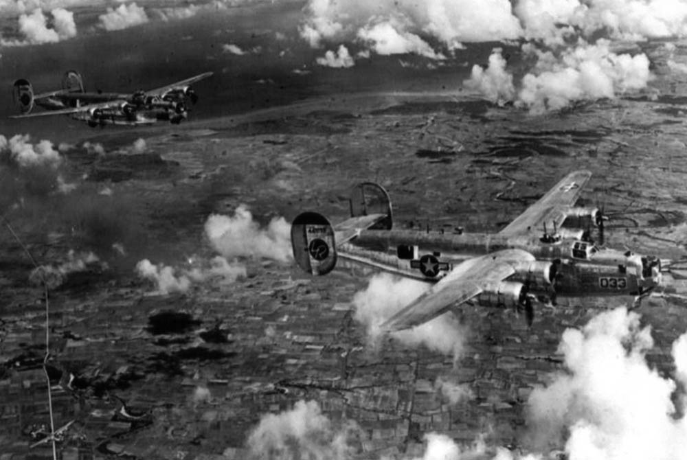 Formation of B-24 Liberators from the 307th BG flies in World War II. (U.S. Air Force Photograph.)