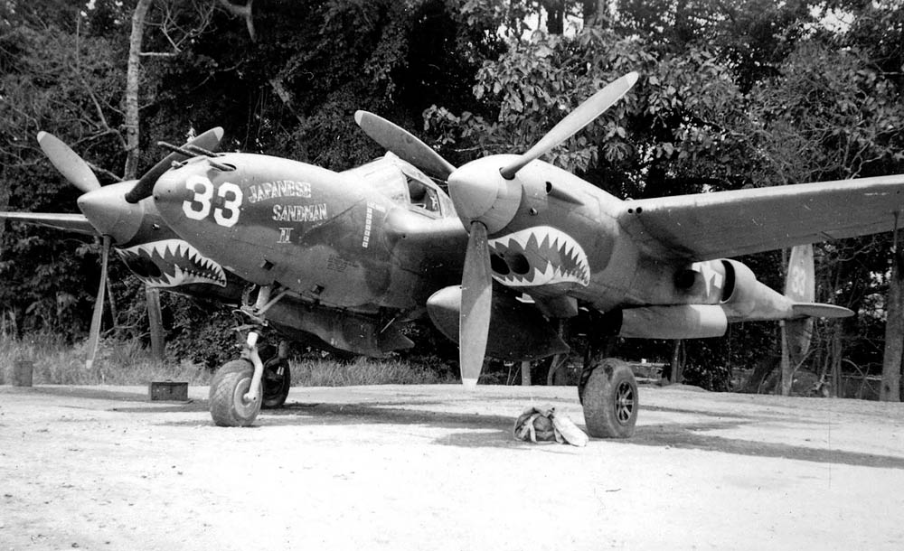 P-38 Lightning "Japanese Sandman II" of the 39th Pursuit Squadron in New Guinea, 1943. (U.S. Air Force Photograph.)