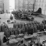 A B-17F Flying Fortress undergoes final assembly and inspection in a hangar at Douglas Aircraft factory in Long Beach, California in 1942. (U.S. National Archives Photograph / Alfred T. Palmer.)