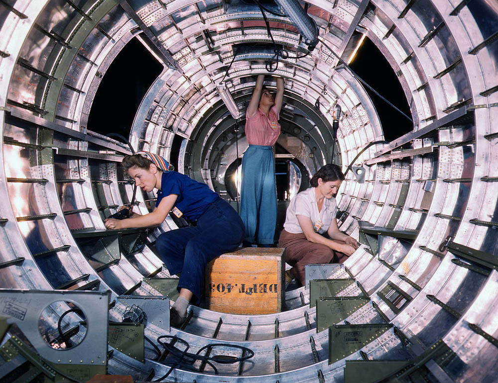 Color photograph of women factory workers at work in the fuselage of a B-17 Flying Fortress bomber at Douglas Aircraft Company in Long Beach, California, October 1942. (Alfred T. Palmer / Office of War Information.)