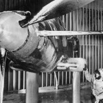 Ice on the fuselage and propellers of a test aircraft in the Icing Research Tunnel at the Aircraft Engine Research Laboratory of the National Advisory Committee for Aeronautics (NACA) in March 1945.