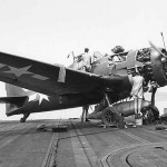 Maintenance work on the F6F Hellcat "Minsi II" on board the USS Essex off the coast of Saipan, July 1944. (Official U.S. Navy Photograph.)