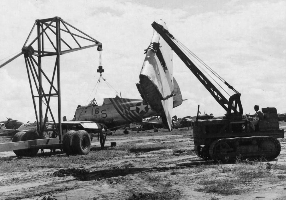 P-47D Thunderbolt is scrapped as part of aircraft salvage operations by the Eastern India Air Depot at Panagarh, India. (U.S. Air Force Photograph.)