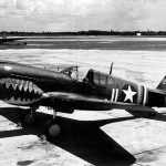 Curtiss P-40K fighter photographed with the typical shark-teeth markings on the nose. (U.S. Air Force Photograph.)