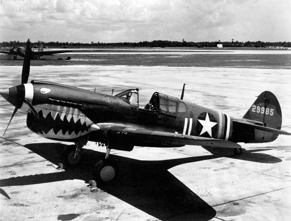 Curtiss P-40K fighter photographed with the typical shark-teeth markings on the nose. (U.S. Air Force Photograph.)