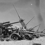 Captured German artillery and flak collected in a Allied salvage dump in Tunisia, 1943. (U.S. Air Force Photograph.)