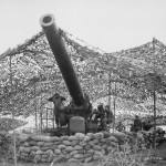 A 240mm howitzer of Battery B, 697th Field Artillery Battalion prepares to fire near Mignano, Italy during WWII. (U.S. Army Photograph.)