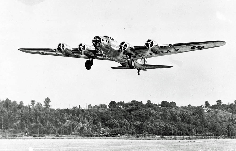 Early-model Boeing B-17B Flying Fortress shows its aerodynamic lines during takeoff. (U.S. Air Force Photograph.)