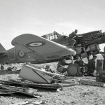 RAF mechanics change the engine on a Curtiss Tomahawk Mark IIB of No. 112 Squadron RAF in the Western Desert, 1941. (Imperial War Museum Photograph.)