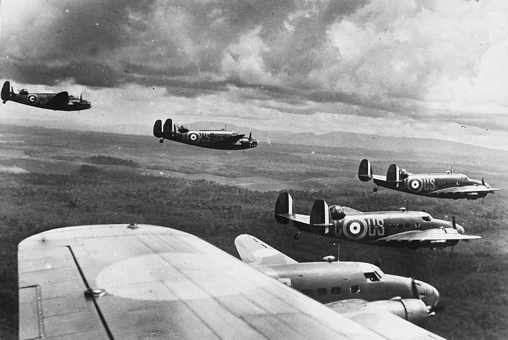 Lockheed Hudson aircraft of the Royal Australian Air Force in formation over Malaya. (U.S. Office for Emergency Management Photograph.)