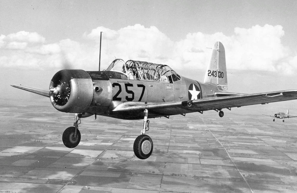 A U.S. Army Air Force Vultee BT-13A Valiant basic trainer in flight during World War II. (U.S. Air Force Photograph.)