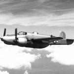 A Beechcraft XA-38 Grizzly prototype in flight showing the forward-firing 75mm cannon. (U.S. Air Force Photograph.)