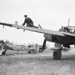 A captured Junkers Ju 88 bomber and Focke Wulf FW 190 fighter of RAF Enemy Aircraft Flight at Collyweston, Northamptonshire, February 1945. (Imperial War Museum Photograph.)