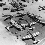 Maintenance work on North American P-51D Mustangs and Republic P-47D Thunderbolts is performed at Lingayen Airfield in the Philippines in April 1945. (U.S. Air Force Photograph.)