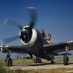 A pilot boards a Royal Air Force Republic P-47 Thunderbolt Mk II of No 30 Squadron. (Imperial War Museum Photograph.)