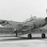 The clean lines of a TBM-1C Avenger with wing-mounted radar pod are shown to good effect at NATC Patuxent River, Maryland, July 1944. (U.S. Navy Photograph.)