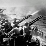 Quad 40mm antiaircraft guns firing aboard the U.S. Navy aircraft carrier USS Hornet (CV-12) in February 1945. (U.S. Navy Photograph.)