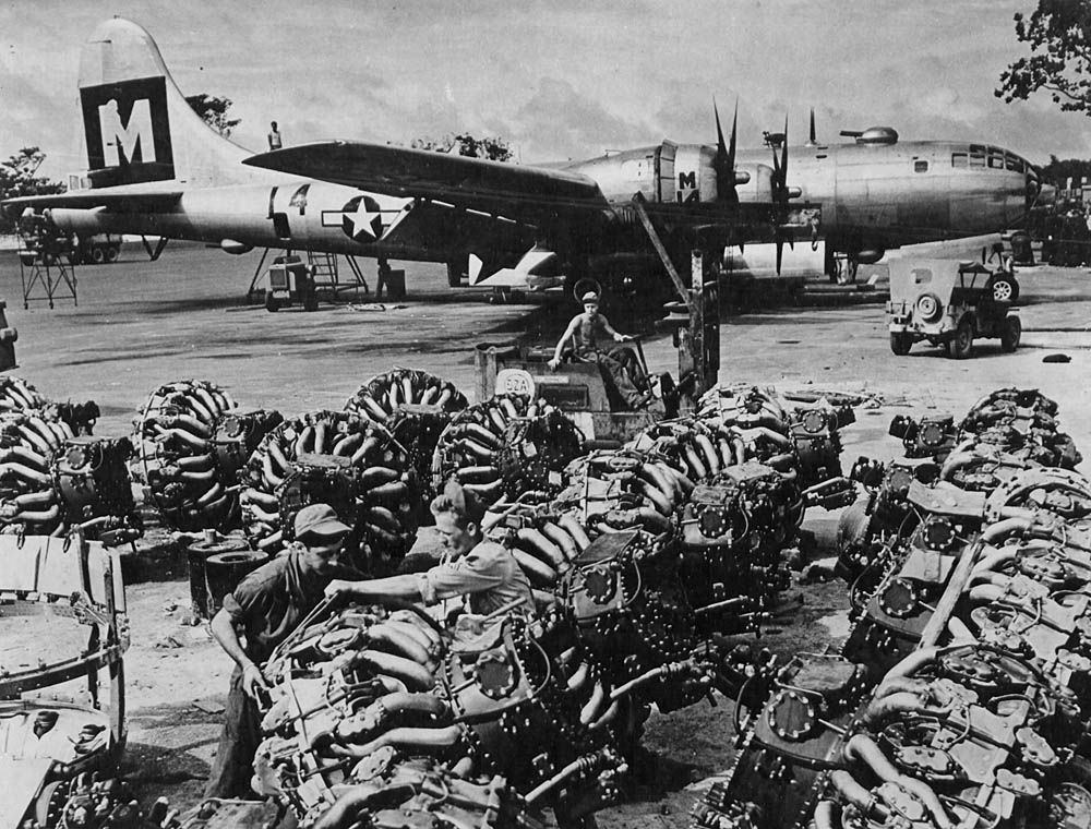 New engines for the B-29 Superfortresses of the 20th Air Force are piled on the airfield on Guam. (U.S. Air Force Photograph.)