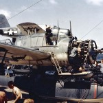 Vought OS2U Kingfisher floatplanes receive maintenance and engine overhauls on the deck of the battleship USS South Dakota (BB-57) during World War II. (U.S. Navy Photograph.)