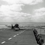 An SBD Dauntless dive bomber takes off from the training aircraft carrier USS Wolverine (IX-64) in March 1943. (U.S. Navy Photograph.)