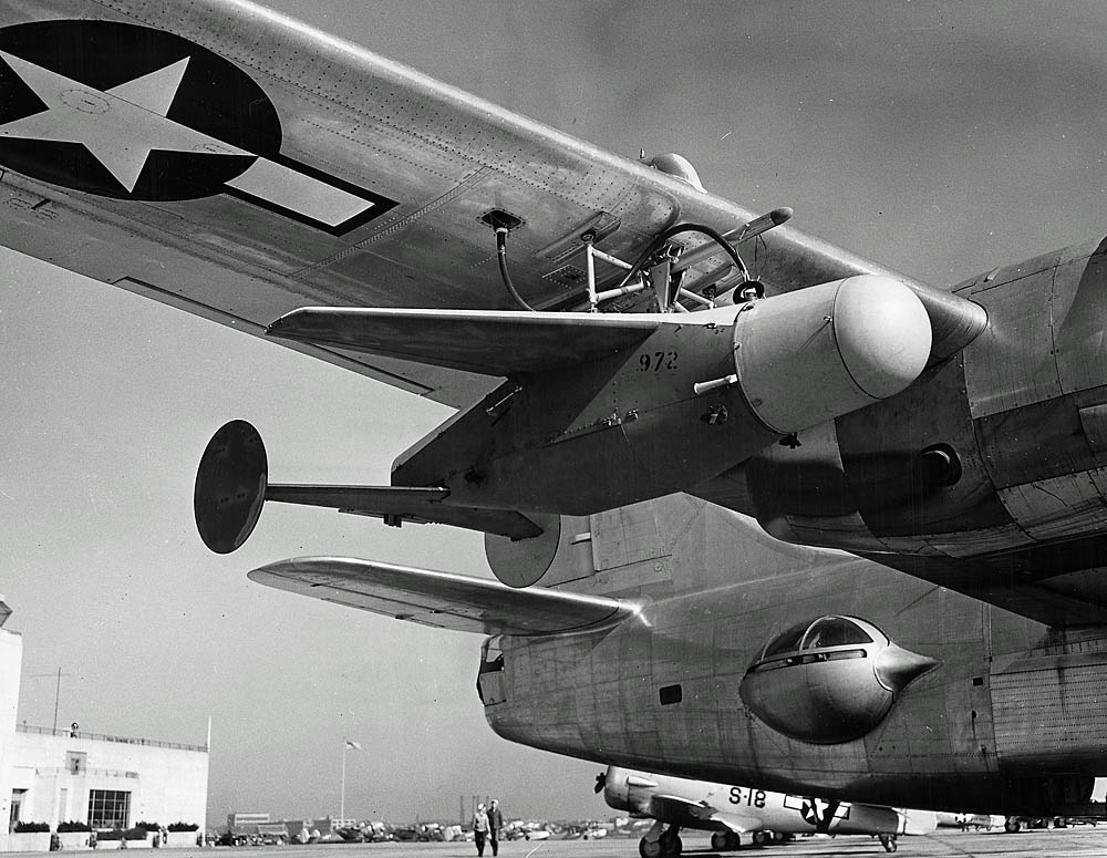 A U.S. Navy ASM-N-2 "BAT" radar-guided bomb mounted under the wing of a Consolidated PB4Y-2 Privateer at the Philadelphia Ordnance District during development and testing. (U.S. National Archives Photograph.)