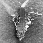 Aerial view of the U.S. Navy aircraft carrier USS Enterprise (CV-6) underway in the Pacific, March 1944.