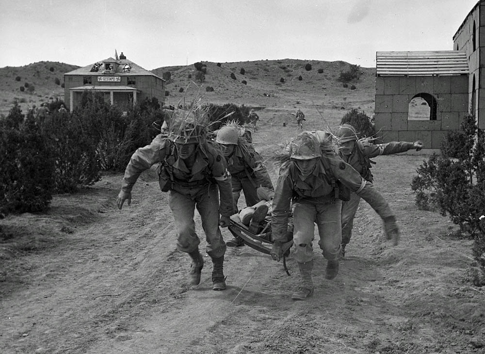 U.S. Army Medical Corps soldiers train at Camp Carson, Colorado, April 1943. (U.S. National Archives and Records Admin. Photograph.)