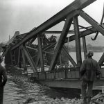 U.S. First Army soldiers at the Remagen Bridge over the Rhine after the bridge's collapse. (U.S. National Archives Photograph.)