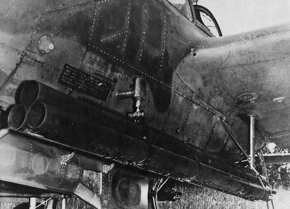 Test installation of a triple rocket launcher mounted on a P-38 Lightning. (U.S. Air Force Photograph.)