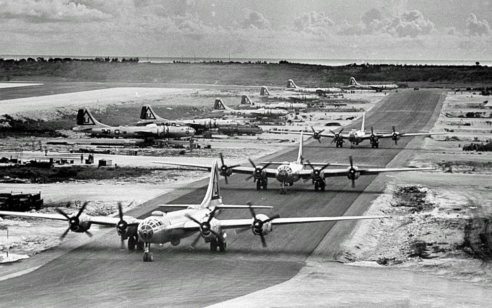 Boeing B-29 Superfortress bombers of the 462nd Bomb Group line up on West Field, Tinian Island in the Mariana Islands, 1945. (U.S. Air Force Photograph.)