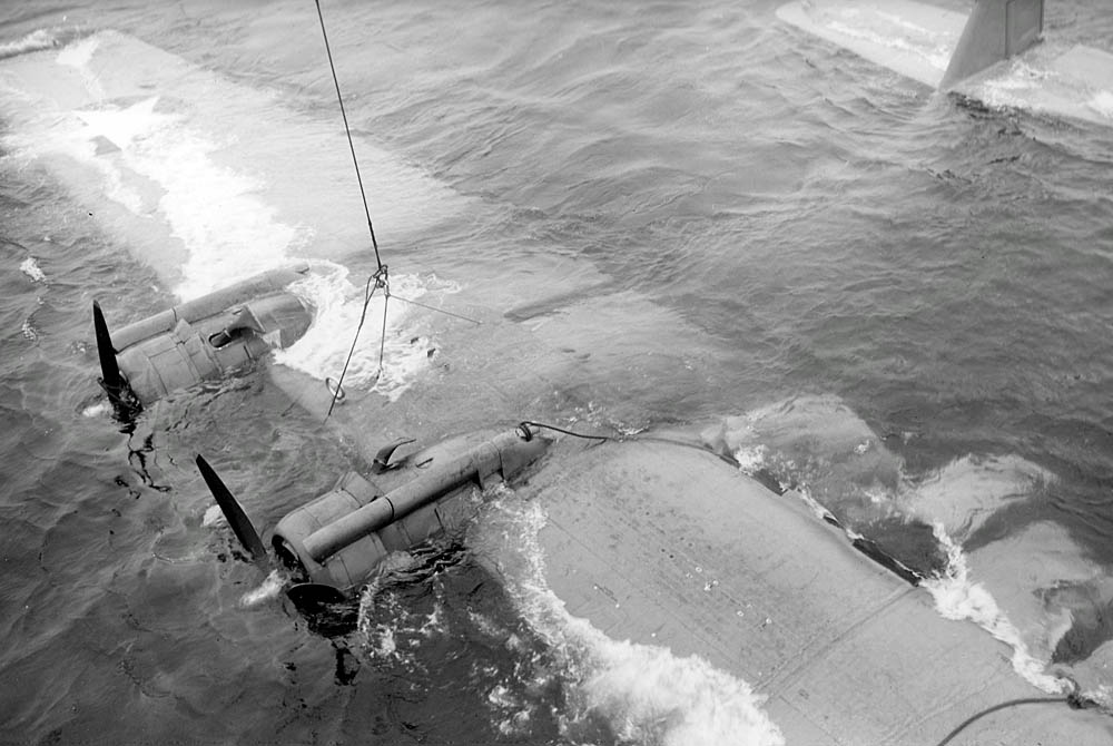 A U.S. Navy Consolidated PBY-5 Catalina from Patrol Squadron VP-45 is salvaged at Casco Cove, Attu, Alaska in August 1943. (U.S. Navy Photograph.)