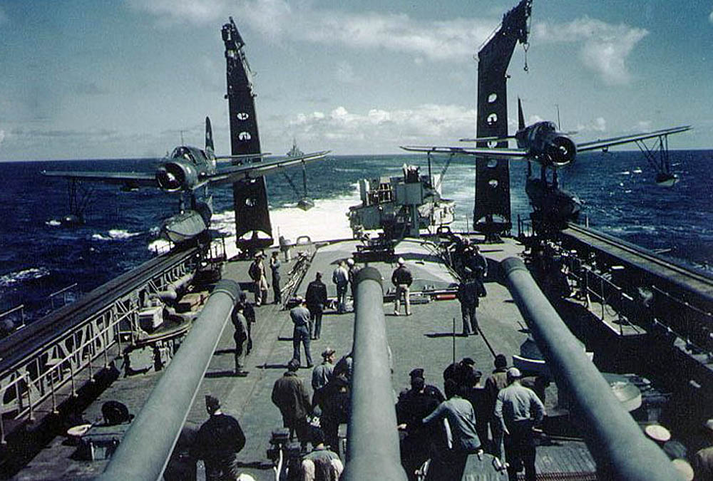 The U.S. Navy heavy cruiser USS Quincy (CA-71) prepares to launch Vought OS2U Kingfisher floatplanes during the Invasion of Southern France, August 1944. (Official U.S. Navy Photograph.)