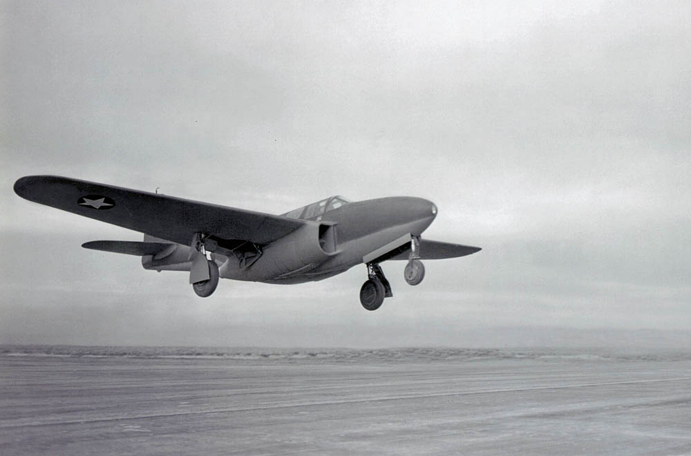 The Bell XP-59A Airacomet jet aircraft lifts off from the surface of Rogers Dry Lake in October 1942. (U.S. Air Force Photograph.)