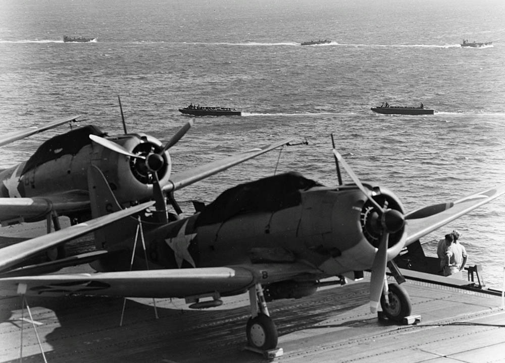 Landing craft maneuver behind the aircraft carrier USS Enterprise in July 1942 during the Guadalcanal-Tulagi Operation. (Official U.S. Navy Photograph via U.S. National Archives.)