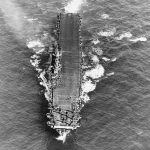 The aircraft carrier USS Enterprise (CV-6) underway in the Pacific in March 1944 with the flight deck crowded with Douglas SBD-5 Dauntless aircraft of Bombing Squadron 10 (VB-10). (U.S. Navy Photograph.)