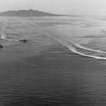 U.S. Navy Destroyer Squadron 12 (DesRon 12) salutes the dead with S-turns in Ironbottom Sound in March 1944. The destroyers are USS Farenholt (DD-491), USS Buchanan (DD-484), USS Woodworth (DD-460), USS Lardner (DD-487) and USS Lansdowne (DD-486). (Official U.S. Navy Photograph.)