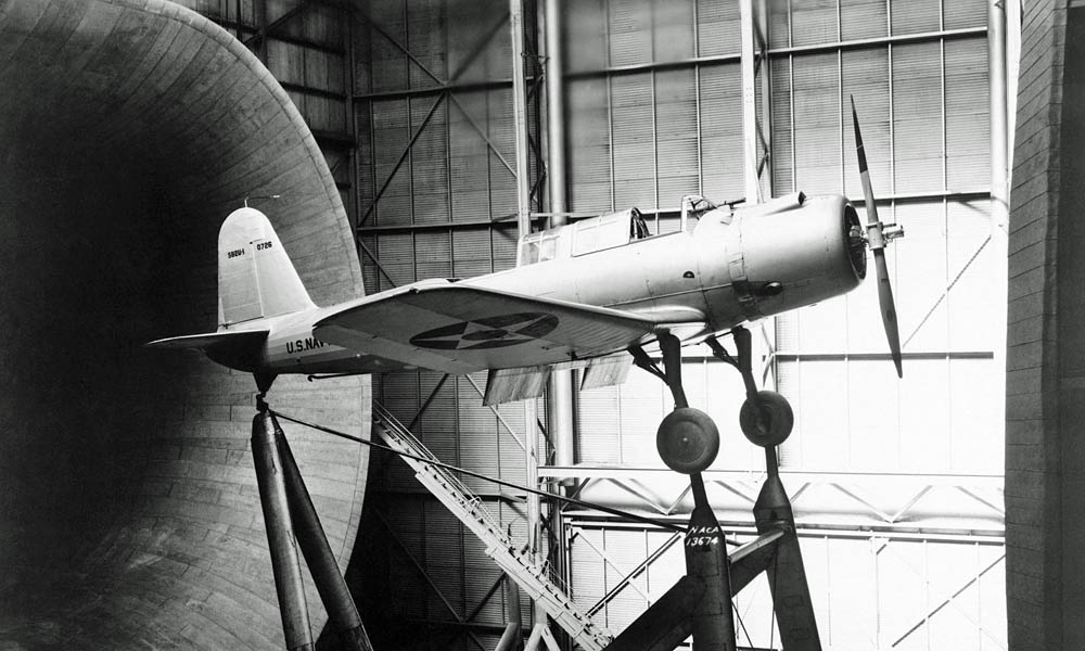 A full-scale model of the Vought SB2U-1 Vindicator is used in drag reduction research in Langley's 30 x 60 Full Scale Tunnel in September 1937. (NASA Photograph.)