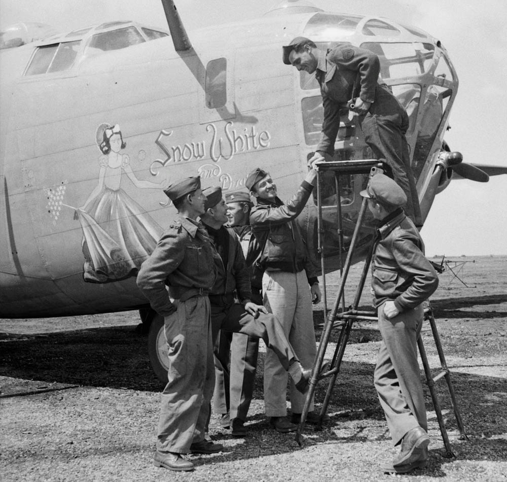 Consolidated B-24 Liberator "Snow White and the Seven Dwarves" of the 9th Air Force photographed at a base in Libya in 1943. (Library of Congress Photograph.)