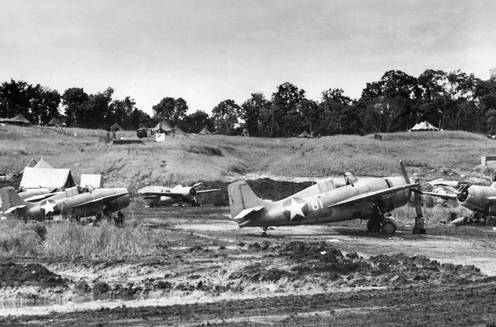 A collection of U.S. Navy Grumman F4F-4 Wildcat fighters from Escort-Fighter Squadron VGF-27 parked alongside Fighter Strip No. 1 on Guadalcanal in February 1943. (U.S. Navy Photograph.)