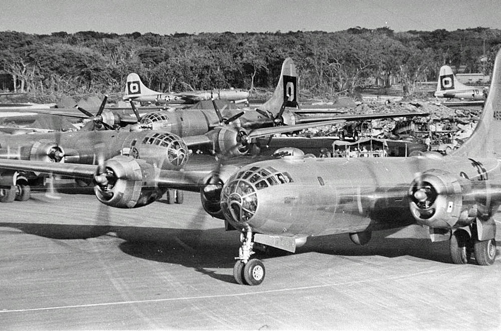 B-29 Superfortresses from the 29th Bombardment Group taxi at North Field, Tinian in 1945. (U.S. Air Force Photograph.)