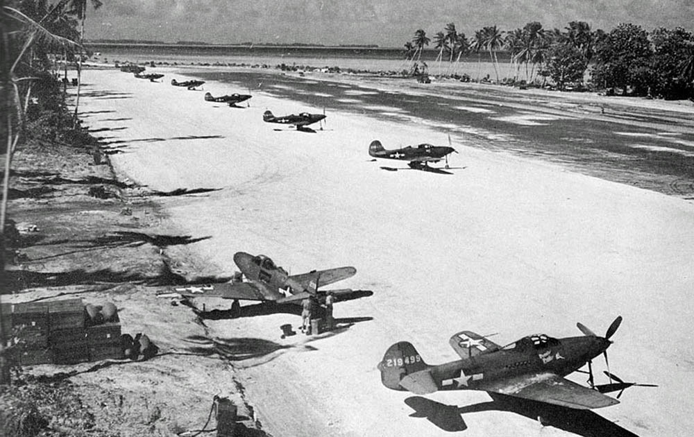 P-39Q Airacobra fighters from the 46th Fighter Squadron, 15th Fighter Group parked on Makin Island in the Gilberts in December 1943. (U.S. Army Air Force Photograph.)