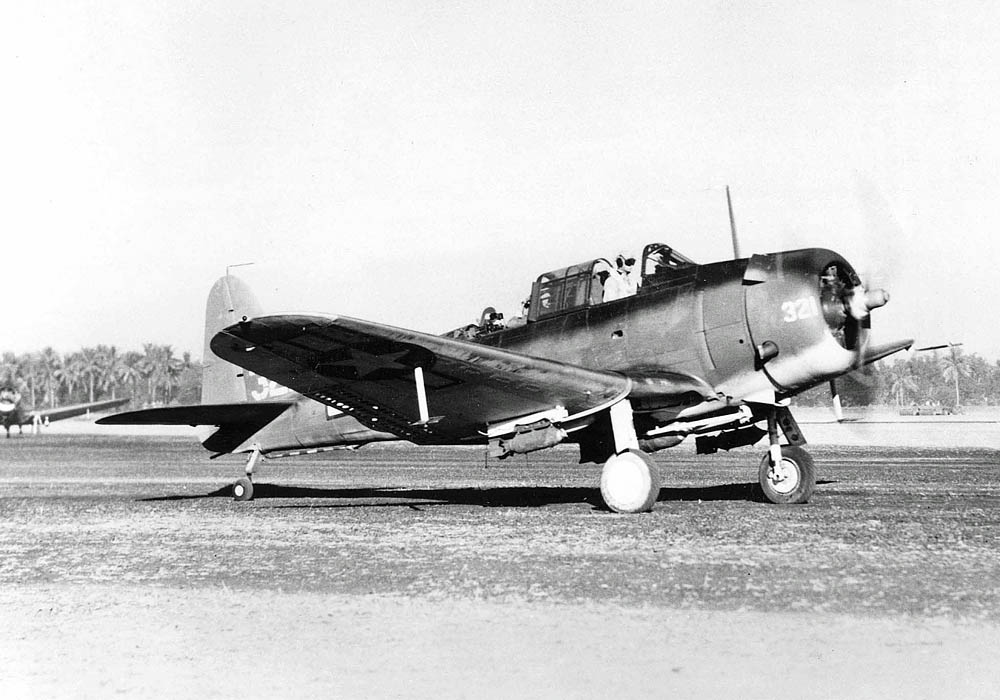 A U.S. Marine Corps Douglas SBD Dauntless dive bomber takes off for a mission over Luzon, Philippines in 1945. (U.S. Navy Photograph.)