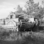 A Churchill tank from the 9th Royal Tank Regiment, 31st Tank Brigade advances toward Goch, Germany in February 1945. (Imperial War Museums Photograph.)