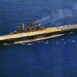 The U.S. Navy aircraft carrier USS Saratoga (CV-3) underway with Grumman F4F-4 Wildcats, Douglas SBD-3 Dauntlesses, and a Grumman TBF-1 Avenger visible on the deck. (U.S. Navy Photograph.)