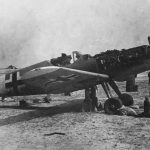 Soldiers of the 87th Fighter Squadron work on a captured Messerschmitt Bf 109G fighter in Tunisia, April 1943. (U.S. Air Force Photograph)