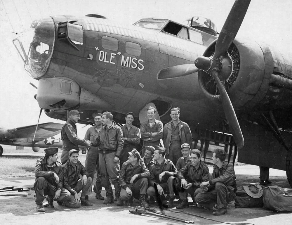 Air crew and ground crew pose in front of the Boeing B-17 Flying Fortress 'Ole' Miss Destry of the 366th BS, 305th BG in July 1944 in England. (U.S. Air Force Photograph.)