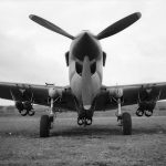 A Curtiss P-40 Kittyhawk of No. 450 Squadron RAAF awais a mission loaded with six 250 lb bombs mounted under the wings and fuselage in North Africa. (Australian War Memorial Photograph.)