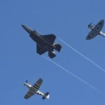 A U.S. Air Force F-35A Lightning II, P-51D Mustang and VS Spitfire fly in formation in a USAF heritage flight during the 2018 Royal International Air Tattoo (RIAT) at RAF Fairford in July 2018. (U.S. Air Force Photograph by TSgt Brian Kimball.)